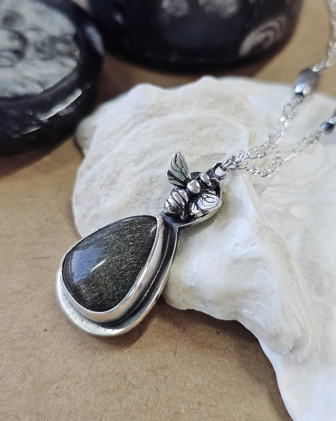 bee necklace with gold sheen obsidian gemstone on oxidized sterling silver