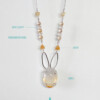 bunny necklace with semi opaque agate cabochon sets on sterling silver rabbit silhouette