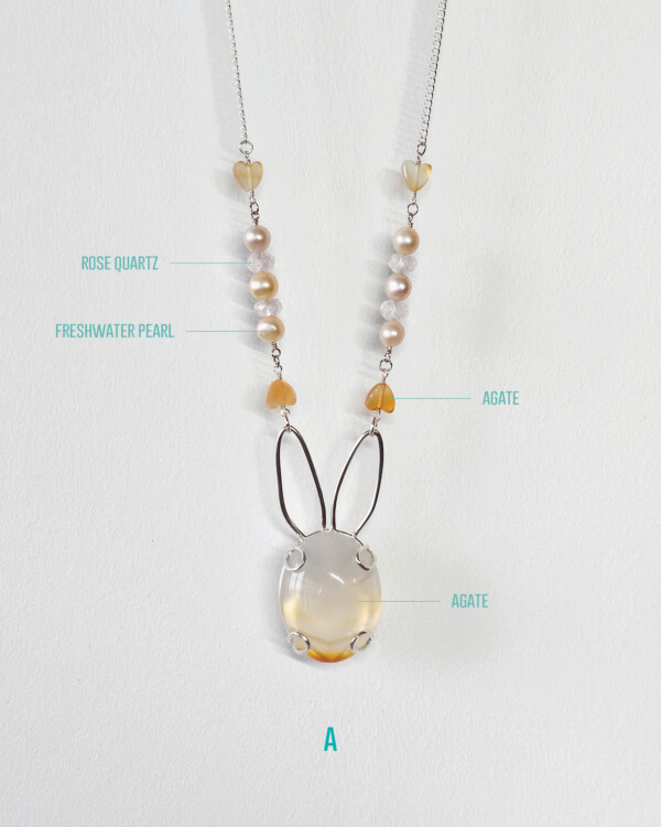 bunny necklace with semi opaque agate cabochon sets on sterling silver rabbit silhouette