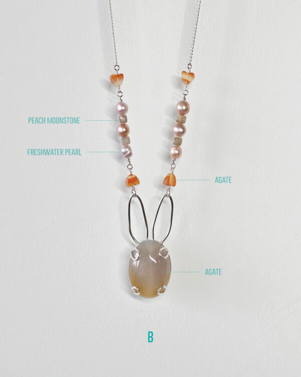 bunny necklace with semi opaque agate cabochon sets on sterling silver rabbit silhouette