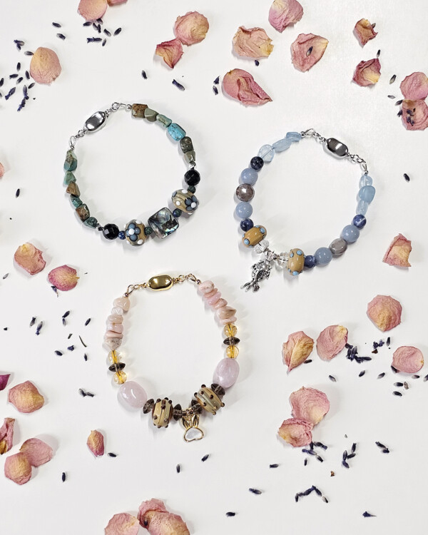 a mixed media of ceramic beads and gemstone combination bold bracelets