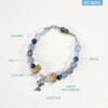 a mixed media of ceramic beads and gemstone combination bold bracelet in koi wave theme