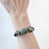a mixed media of ceramic beads and gemstone combination bold bracelet in richmond garden theme