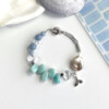mermaid tail charm, soothing amazonite, clear quartz, angelite, baroque pearl combination bracelet