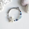 white shell starfish with raw aquamarine stone bracelet