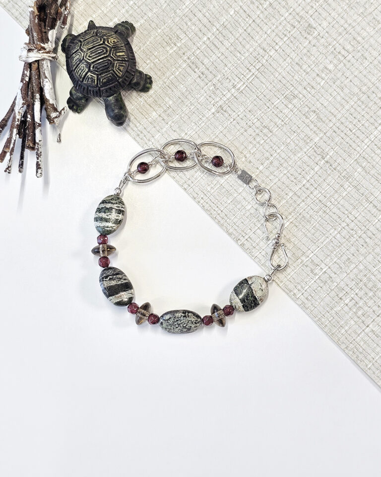green zebra jasper stone bracelet with sterling silver link chain and garnet beads
