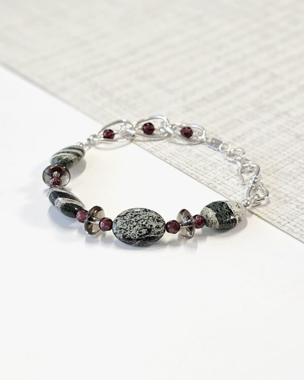 green zebra jasper stone bracelet with sterling silver link chain and garnet beads