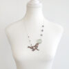 star-splashed seal pendant with faceted aqua obsidian gemstone necklace