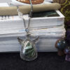 potion of healing pendant necklace with seraphinite gemstone