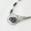 meteor inspired handmade necklace with silver wire-wrapped peacock ore and azurite beads