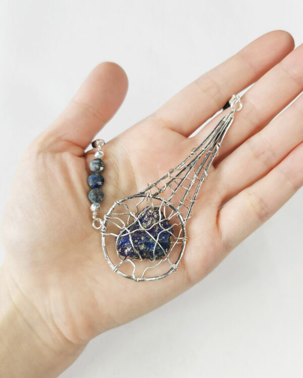 meteor inspired handmade necklace with silver wire-wrapped peacock ore and azurite beads