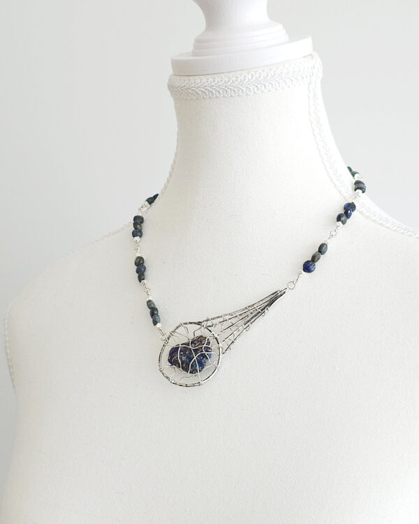 meteor inspired handmade necklace with silver wire-wrapped peacock ore and azurite beads