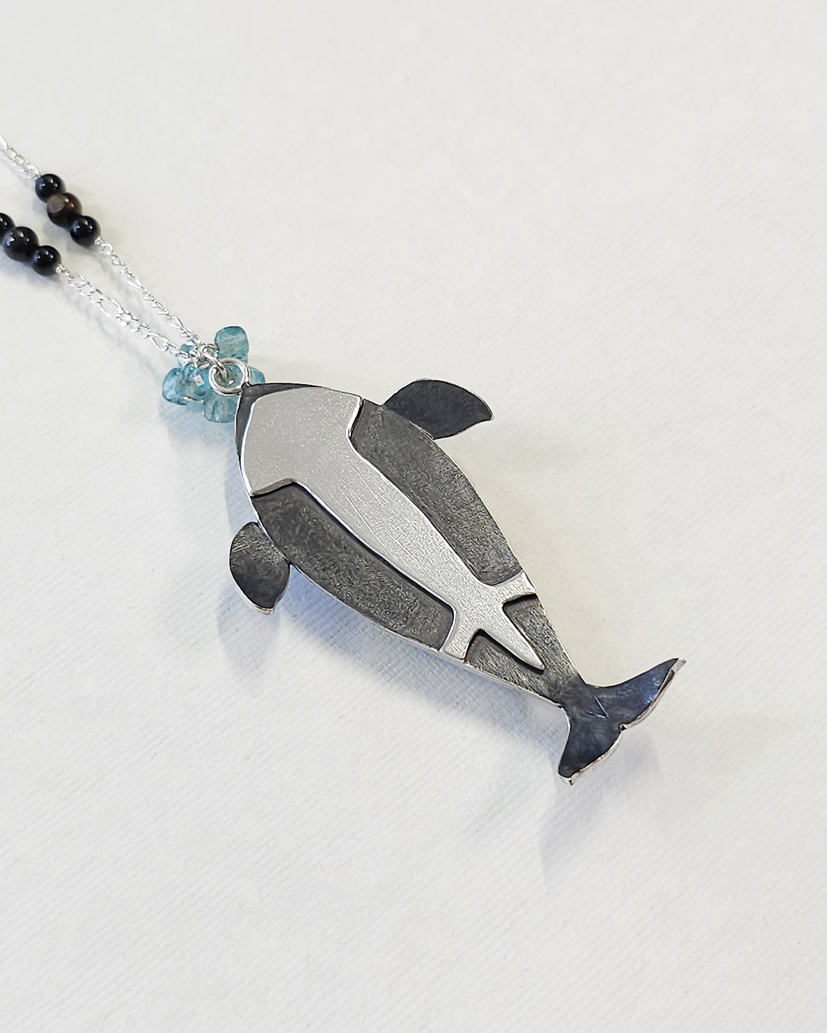 silver orca whale pendant with australian boulder matrix opal cabochon