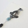 silver orca whale pendant with australian boulder matrix opal cabochon