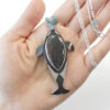 silver orca whale pendant with australian boulder matrix opal cabochon